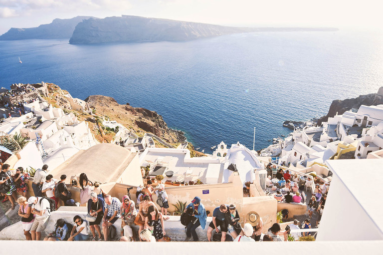 sunset dinner in santorini, greece! more photos in the journal: https://greymoss.com/santorini-greece-arrival-spectacular-sunset/ 