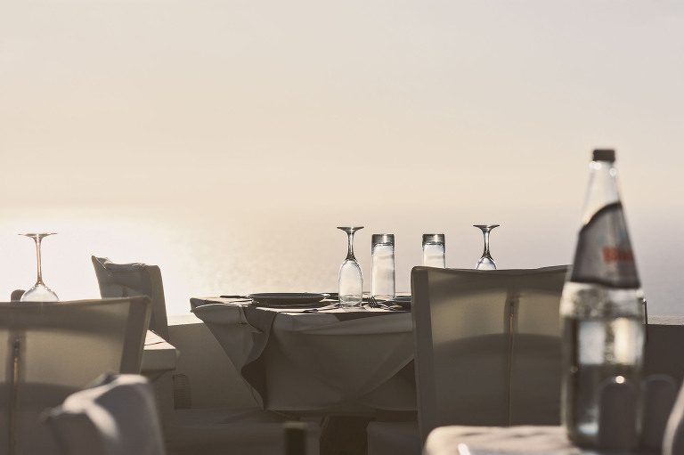 sunset dinner in santorini, greece! more photos in the journal: https://greymoss.com/santorini-greece-arrival-spectacular-sunset/ 