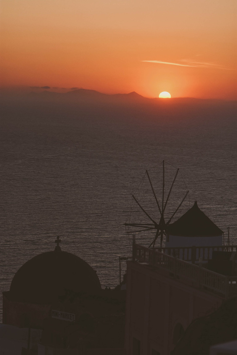 sunset dinner in santorini, greece! more photos in the journal: https://greymoss.com/santorini-greece-arrival-spectacular-sunset/ 